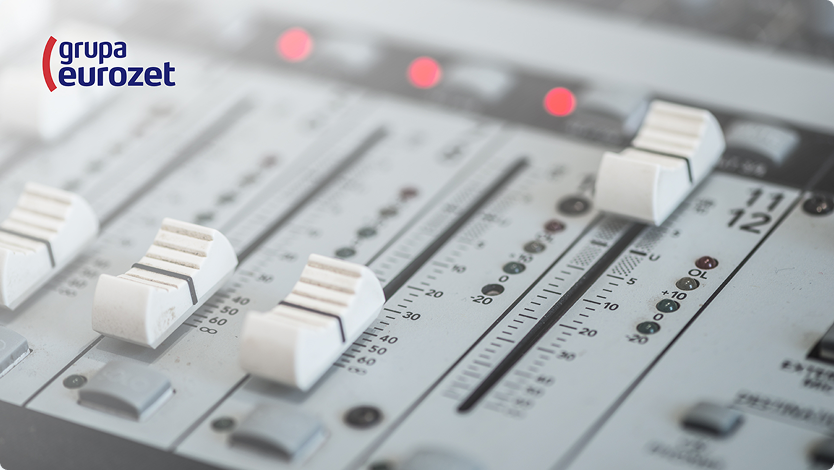 Background image with a lorry driving straight towards the sunset